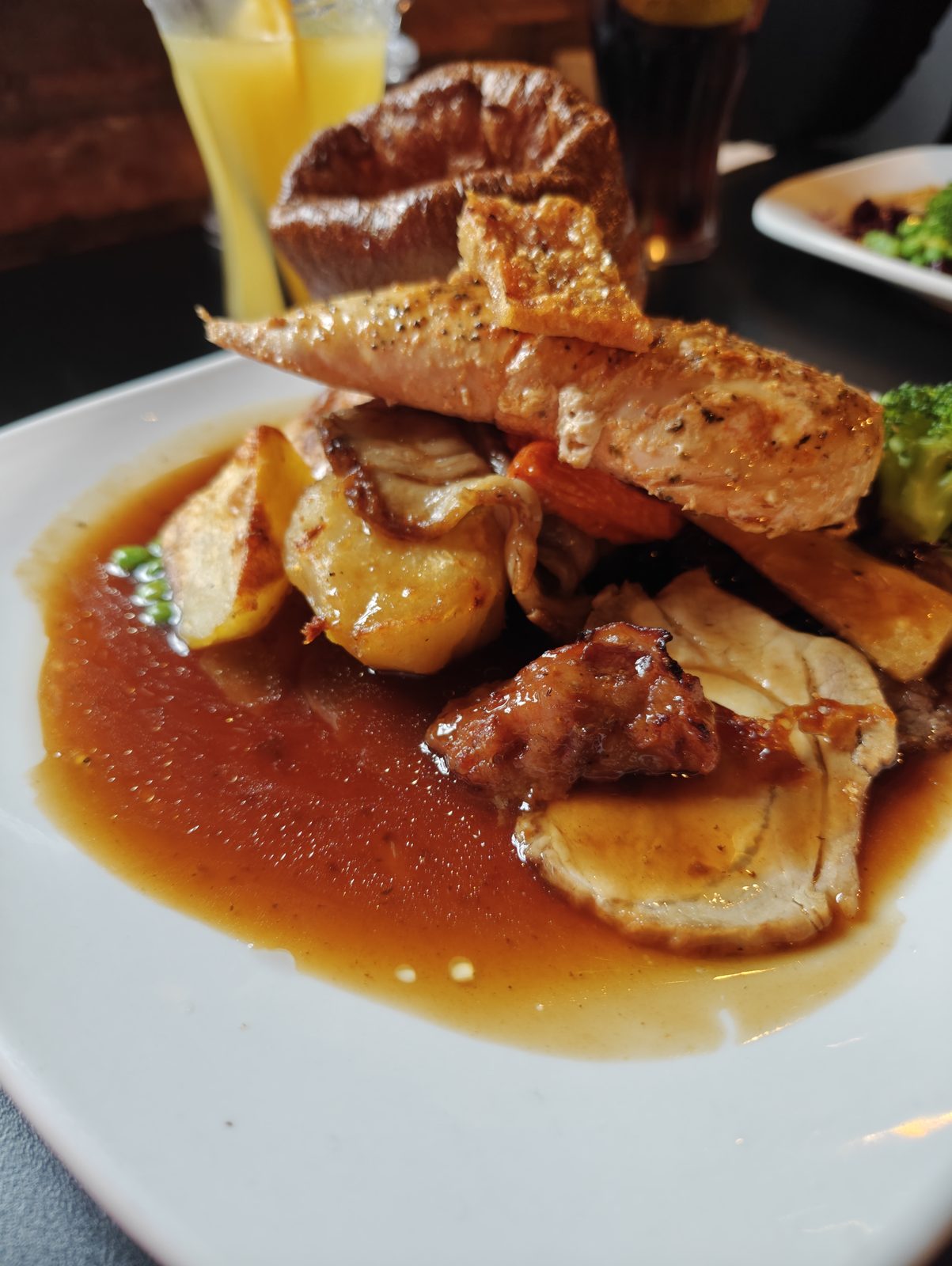 Roast dinner with gravy on the plate