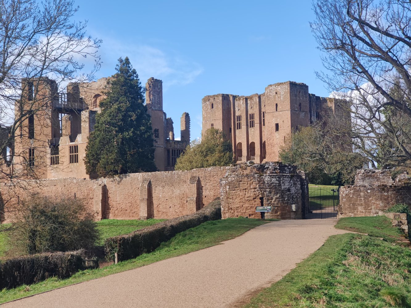 Kenilworth Castle ruins with paths and trees